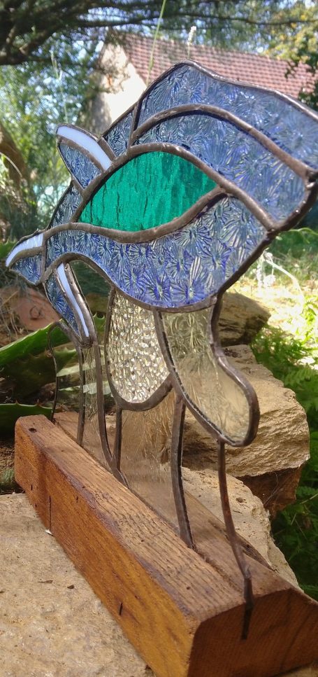 Baleine sur vague sur socle 150€